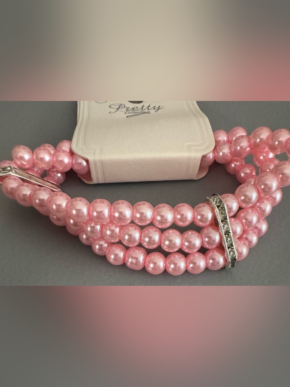 Pink glass Pearl-Style Triple Strand Bracelet with Rhinestone Accents